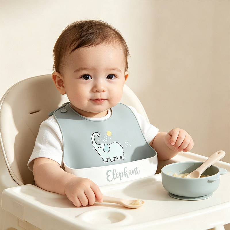 Baby Food Year Old - مريلة تغذية من السيليكون للأطفال بنقوش