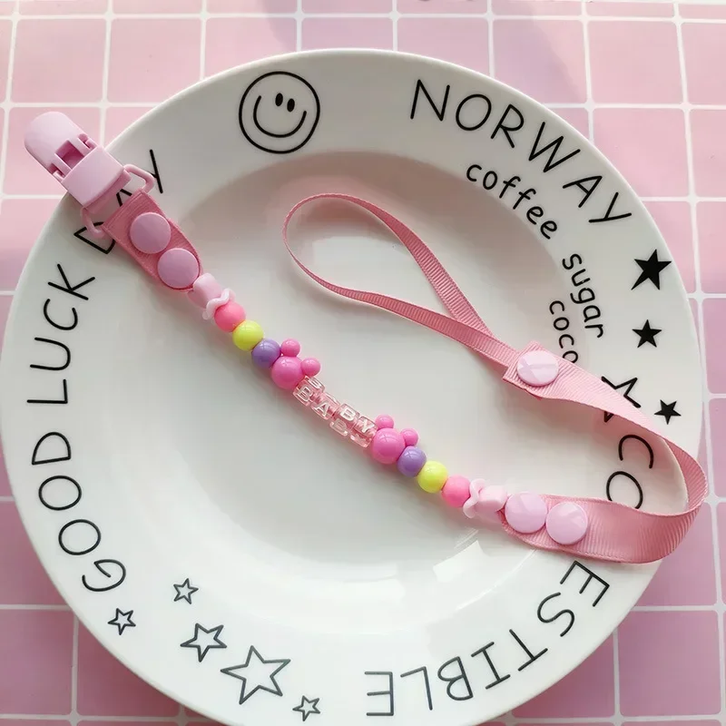 مصاصة سلسلة مقاطع اليدوية حامل - مراجعة Baby Food Teether وسعره