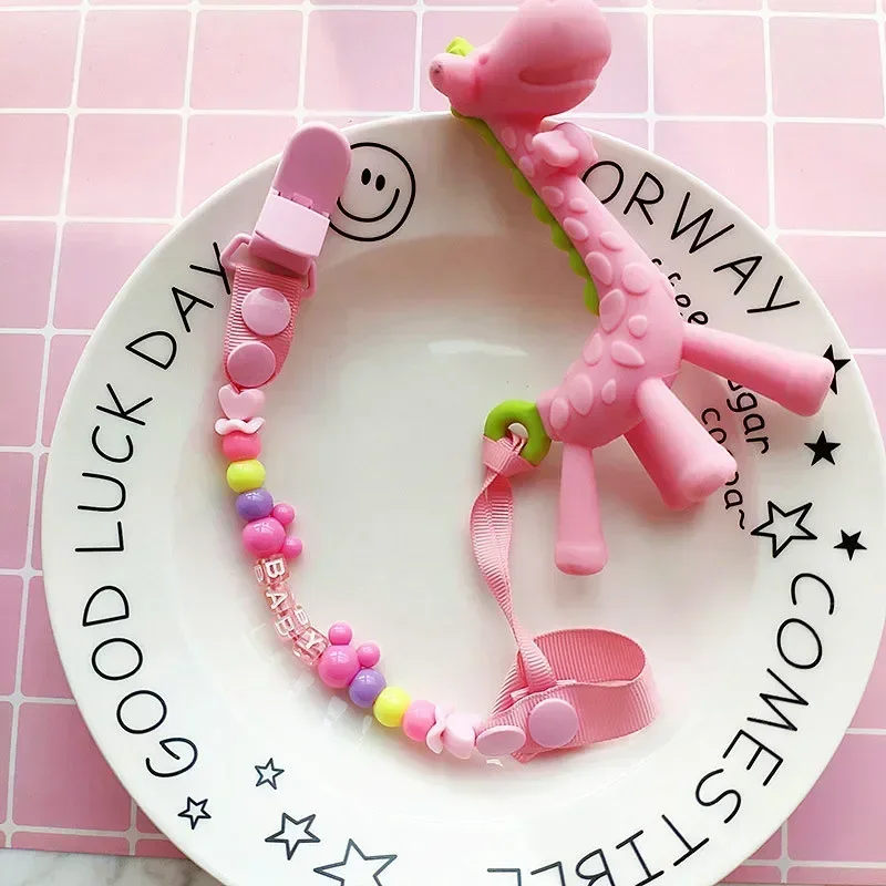 مصاصة سلسلة مقاطع اليدوية حامل - مراجعة Baby Food Teether وسعره