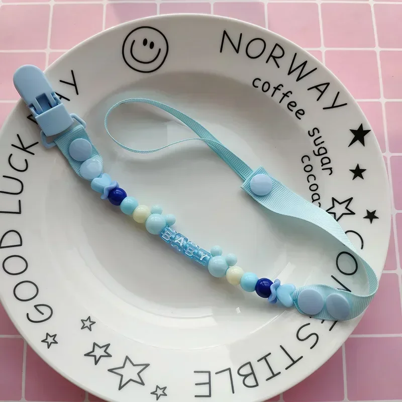 مصاصة سلسلة مقاطع اليدوية حامل - مراجعة Baby Food Teether وسعره